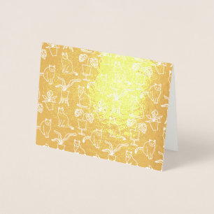 White cats on black foil card