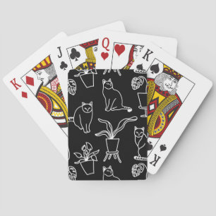 White cats on black playing cards