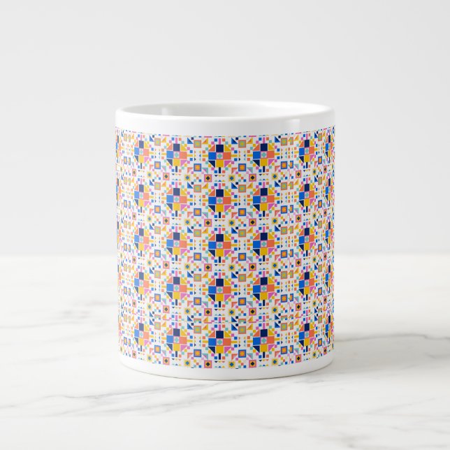 White ceramic mug featuring a colourful geometric  (Front)