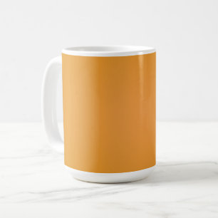 White ceramic mug with a solid orange wrap-around