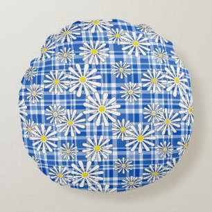 White chamomile flowers on a blue chequered backgr round cushion
