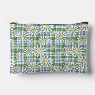 White chamomile flowers on a green blue chequered accessory pouch