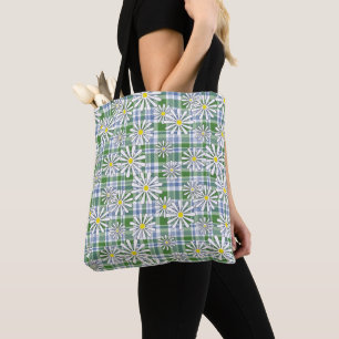 White chamomile flowers on a green blue chequered  tote bag