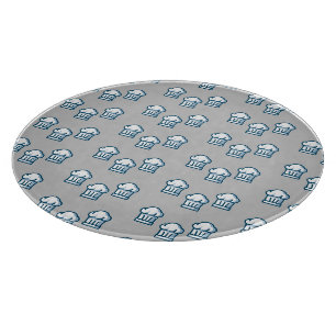 White chef hats on grey cutting board