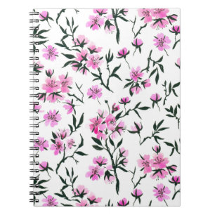 White cherry blossom on white notebook
