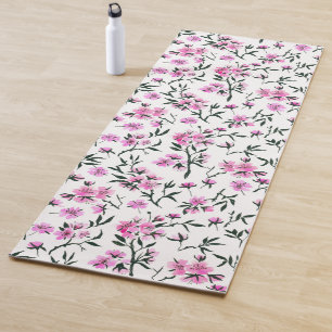 White cherry blossom on white yoga mat
