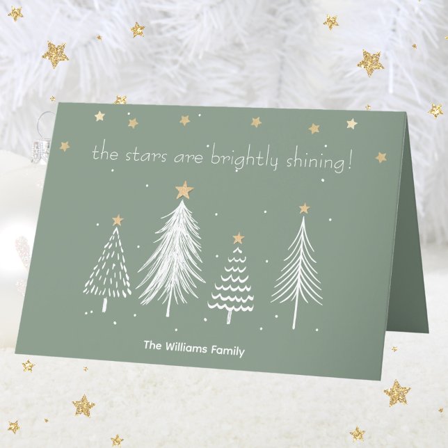 White Christmas Trees, Gold Stars, Family Name Hol Holiday Card (White and Gold Christmas with Family Name Green Holiday Card)
