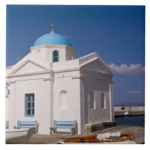 White church on the beach near the Aegean Sea on Tile