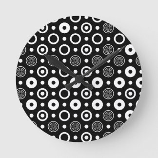 White circles and dots round clock