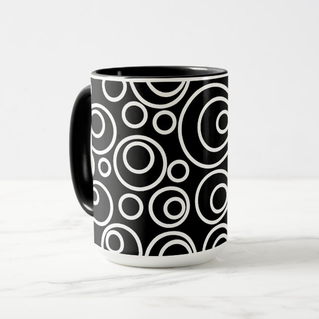White Circles Design on Black Mug (Front Left)