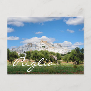 White city and olive trees in Puglia text postcard