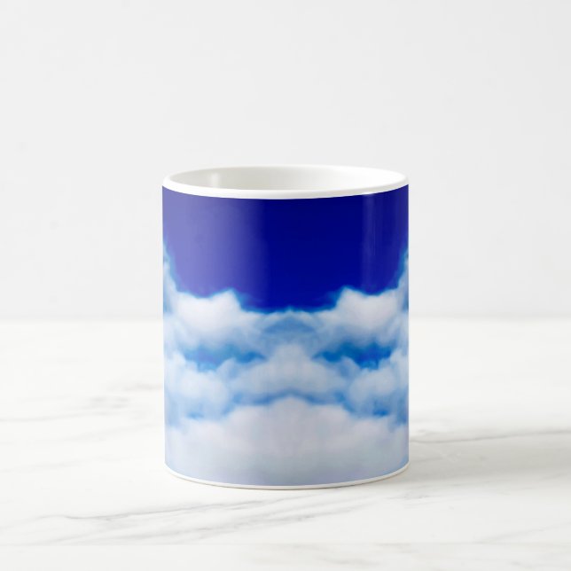 White cloud face against a blue sky coffee mug (Center)