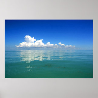 White cloud over a placid ocean poster