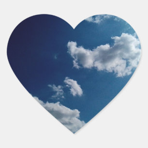 White clouds , on a dark blue sky heart sticker