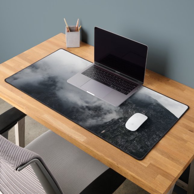 White clouds over the dark rocky mountains desk mat (Office 2)