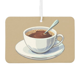 White coffee cup on a saucer filled with coffee car air freshener