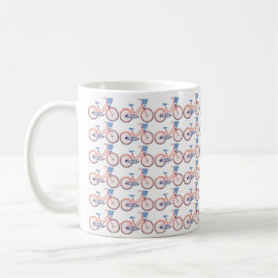 White coffee mug decorated with small bike