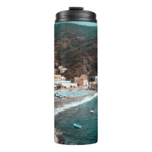 WHITE CONCRETE BUILDING NEAR BODY OF WATER THERMAL TUMBLER