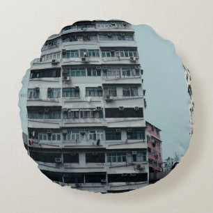 WHITE CONCRETE BUILDING ROUND CUSHION