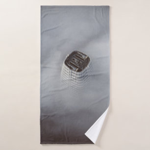 WHITE CONCRETE BUILDING SURROUNDED BY CLOUDS BATH TOWEL