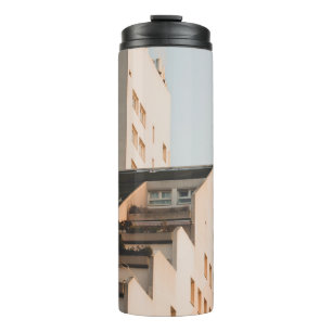 WHITE CONCRETE BUILDING THERMAL TUMBLER