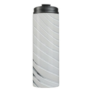 White concrete building wall thermal tumbler