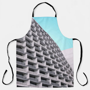 White concrete building with terraces apron