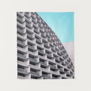 White concrete building with terraces tapestry