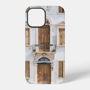 WHITE CONCRETE BUILDING WITH WOODEN DOORS AND WIND iPhone 12 CASE