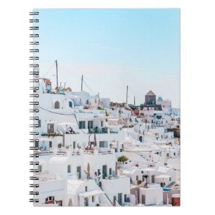 White concrete houses under blue sky at daytime notebook