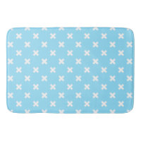White cross stitches on baby blue