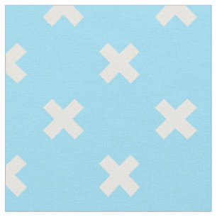 White cross stitches on baby blue fabric