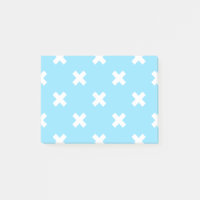 White cross stitches on baby blue
