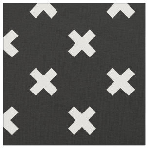 White cross stitches on black fabric