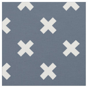White cross stitches on blue-grey fabric
