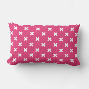White cross stitches on fuchsia lumbar cushion