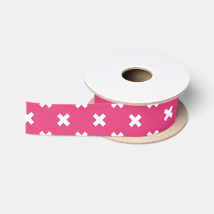 White cross stitches on fuchsia satin ribbon