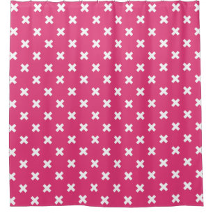 White cross stitches on fuchsia shower curtain