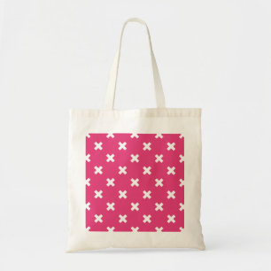 White cross stitches on fuchsia tote bag