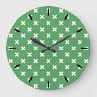 White cross stitches on green