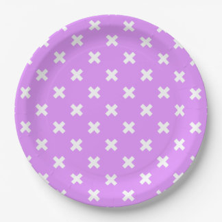 White cross stitches on lilac paper plate