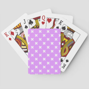 White cross stitches on lilac playing cards