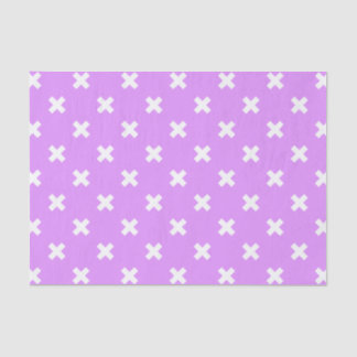 White cross stitches on lilac tissue paper