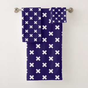 White cross stitches on navy blue bath towel set