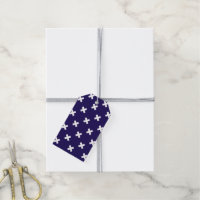White cross stitches on navy blue