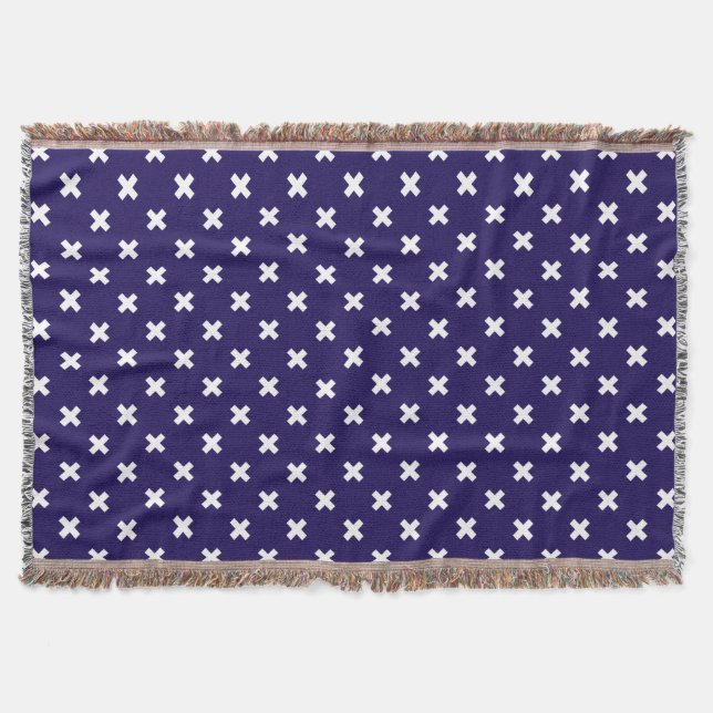 White cross stitches on navy blue throw blanket (Front)