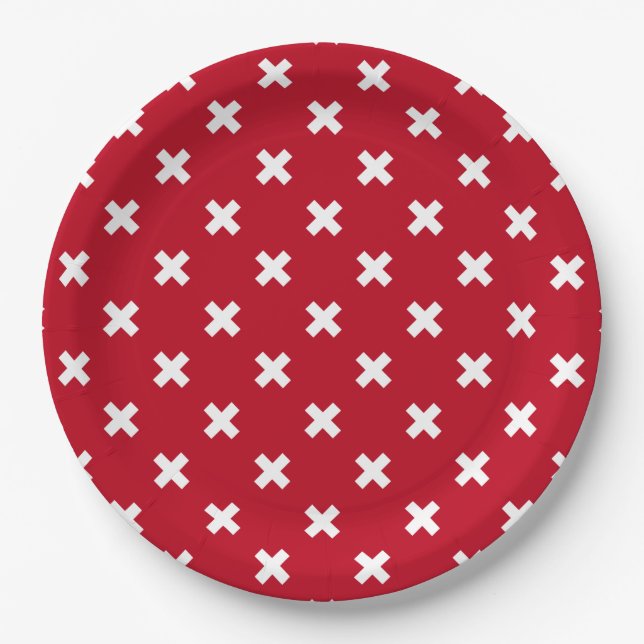 White cross stitches on red paper plate (Front)