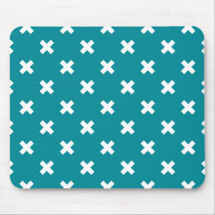 White cross stitches on teal mouse pad