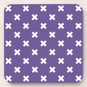 White cross stitches on ultra violet coaster