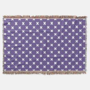 White cross stitches on ultra violet throw blanket